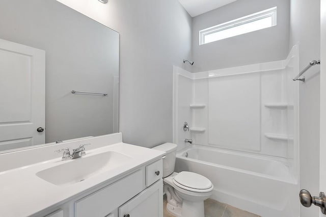 bathroom with bathtub / shower combination, vanity, toilet, and tile patterned floors