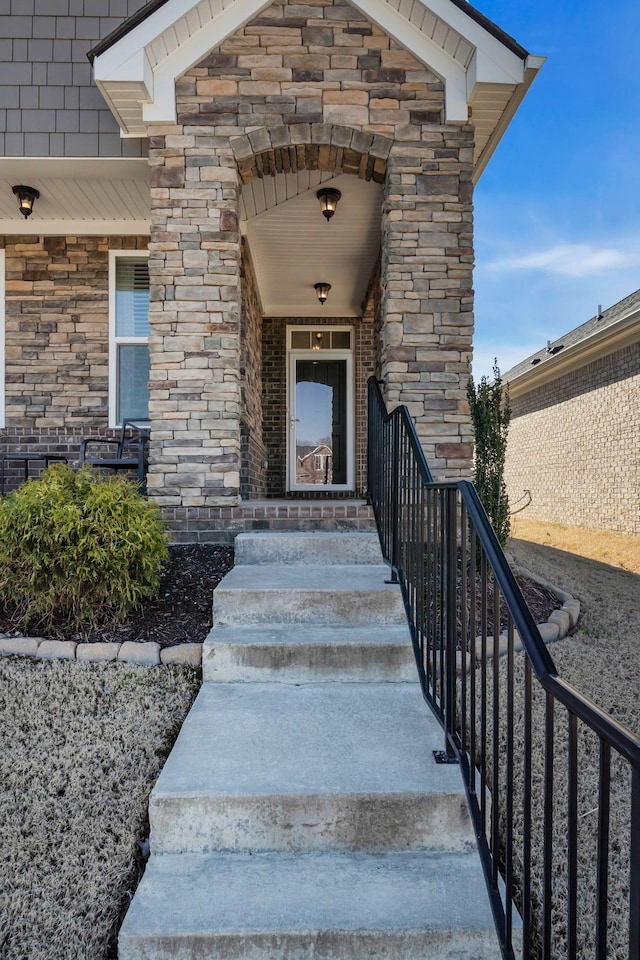 view of exterior entry with stone siding