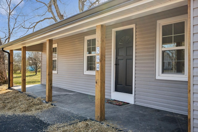 entrance to property with covered porch