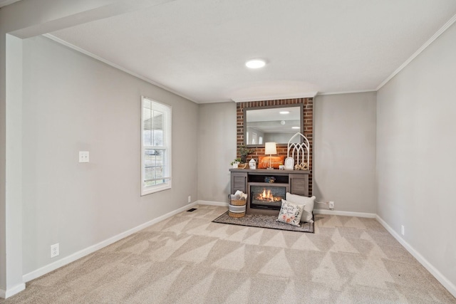 interior space featuring carpet floors, a large fireplace, ornamental molding, and baseboards