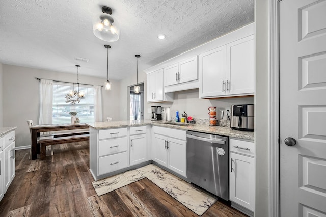 kitchen with dark wood finished floors, a peninsula, stainless steel dishwasher, white cabinetry, and a sink