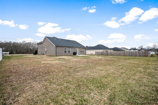 view of yard featuring fence