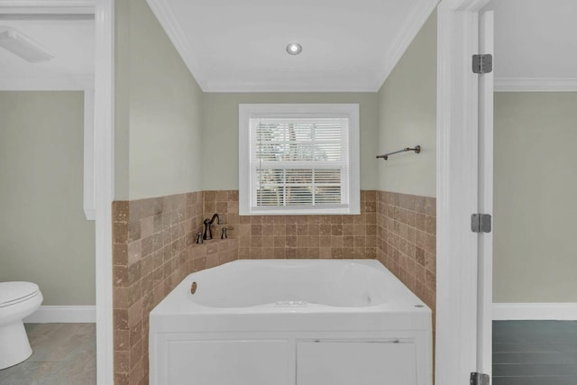 full bathroom featuring ornamental molding, tile patterned flooring, a garden tub, and toilet