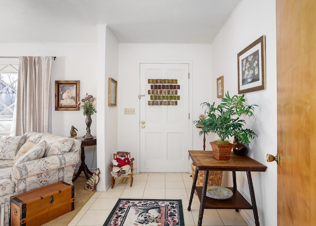 foyer featuring light tile patterned flooring