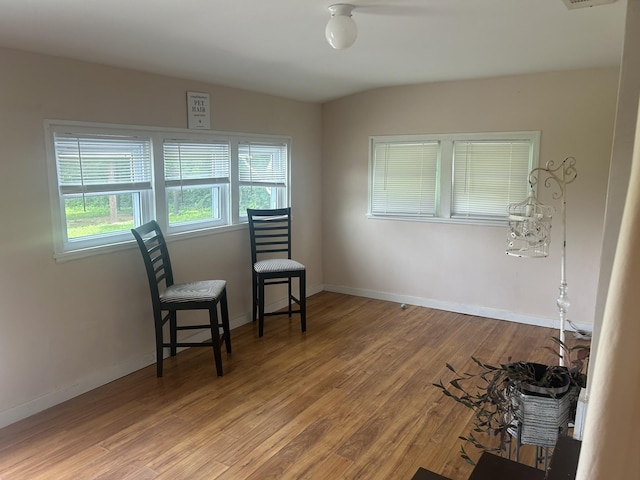 sitting room featuring wood finished floors and baseboards