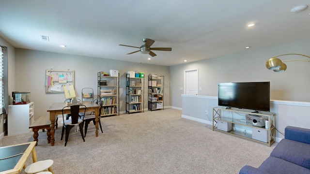 carpeted living room with baseboards, a ceiling fan, visible vents, and recessed lighting