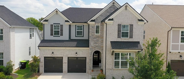 view of front facade featuring a garage, concrete driveway, brick siding, and roof with shingles