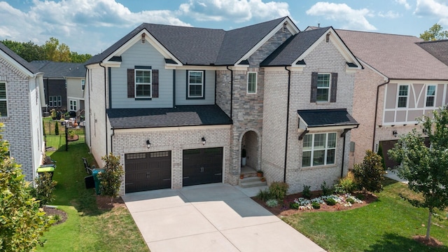 view of front of property with a garage, brick siding, a shingled roof, driveway, and a front yard