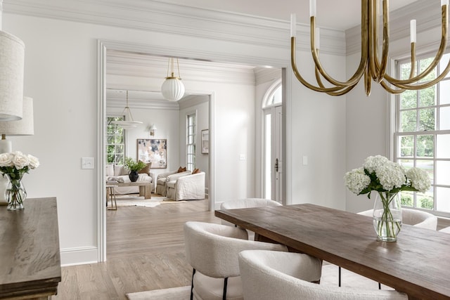 5042 Hill Place Dr, Nashville, TN 37205 - dining area featuring baseboards, crown molding, and wood finished floors