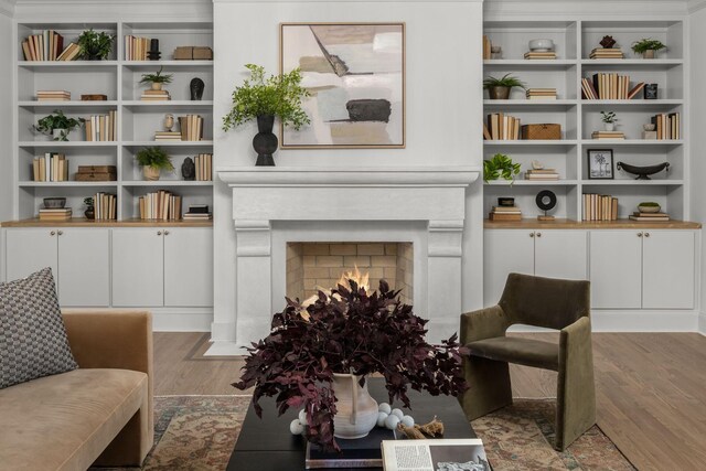 5042 Hill Place Dr, Nashville, TN 37205 - living area featuring a fireplace with flush hearth and wood finished floors