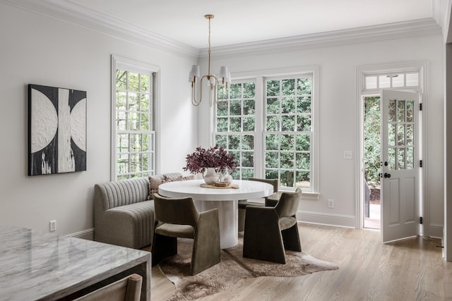 5042 Hill Place Dr, Nashville, TN 37205 - dining space featuring a chandelier, baseboards, wood finished floors, and crown molding