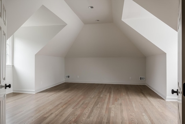 5042 Hill Place Dr, Nashville, TN 37205 - bonus room featuring light wood-style floors, visible vents, vaulted ceiling, and baseboards