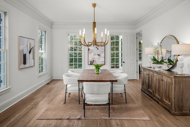 5042 Hill Place Dr, Nashville, TN 37205 - dining area featuring visible vents, baseboards, wood finished floors, crown molding, and a notable chandelier