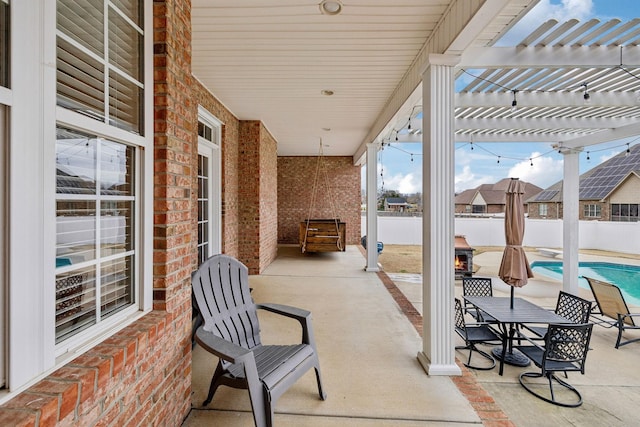 view of patio with a fenced in pool, fence, and a pergola