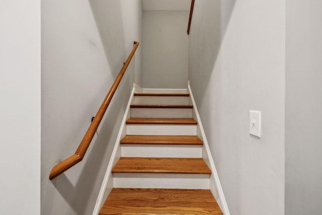 stairway with baseboards