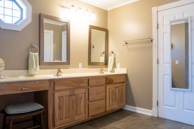 full bathroom with double vanity, a sink, baseboards, and crown molding