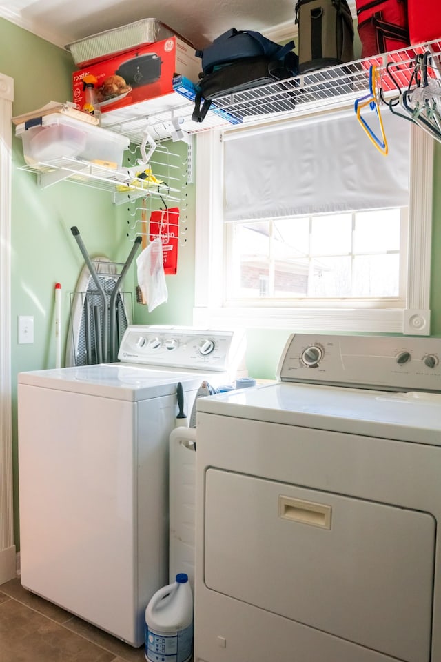 washroom with laundry area and washer and clothes dryer