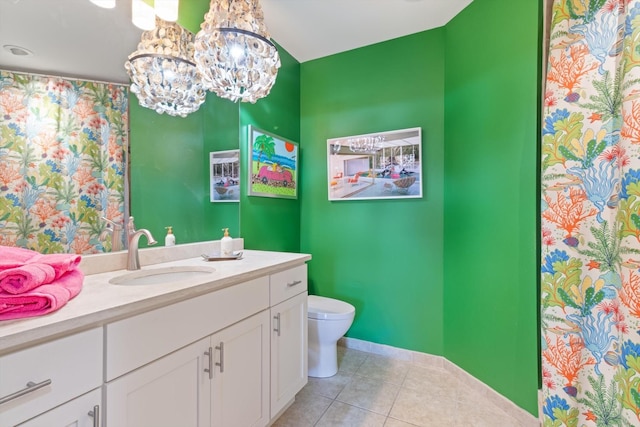 full bathroom with tile patterned flooring, toilet, a notable chandelier, vanity, and a shower with curtain