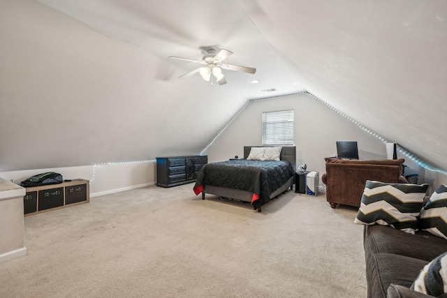 bedroom featuring lofted ceiling, carpet flooring, a ceiling fan, and baseboards