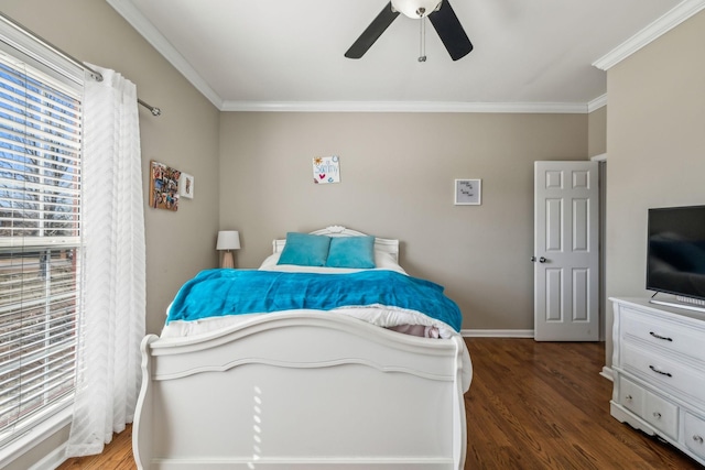 bedroom featuring baseboards, ceiling fan, ornamental molding, and wood finished floors