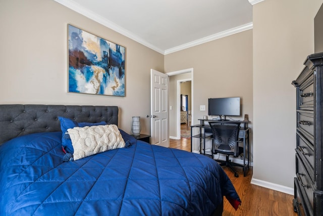 bedroom with ornamental molding, dark wood-type flooring, and baseboards