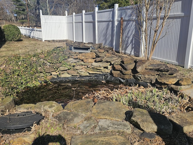 view of yard with fence