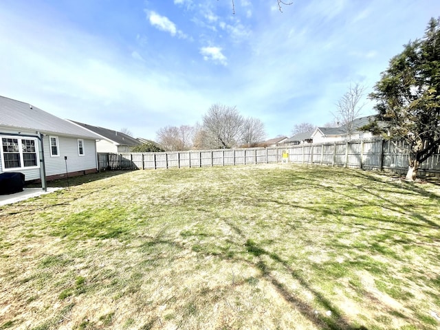 view of yard featuring a fenced backyard