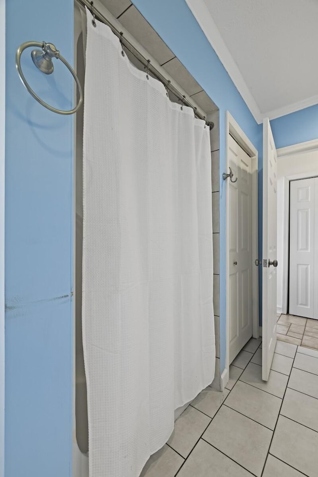 bathroom featuring tile patterned flooring