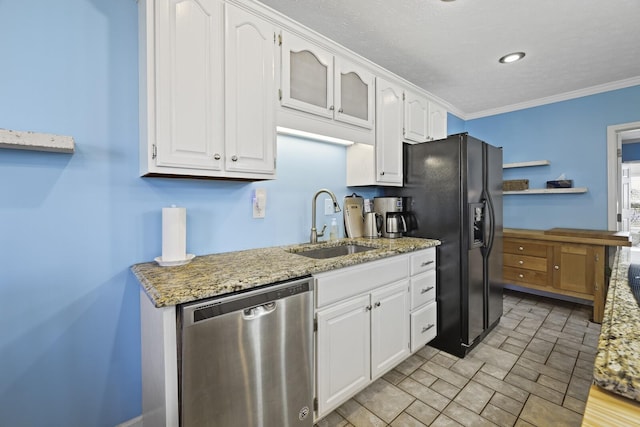 kitchen with a sink, crown molding, white cabinetry, and stainless steel dishwasher
