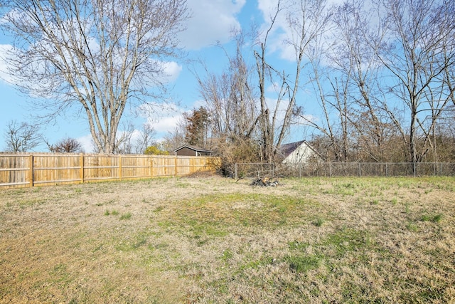 view of yard featuring a fenced backyard