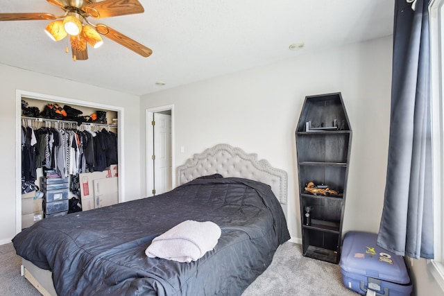 bedroom with ceiling fan, a closet, and carpet flooring