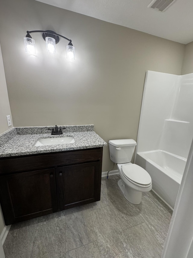 bathroom with toilet, baseboards, visible vents, and vanity