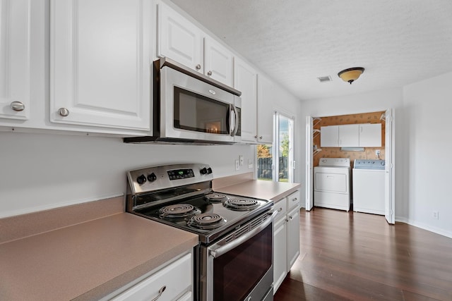 kitchen featuring separate washer and dryer, appliances with stainless steel finishes, dark wood finished floors, and white cabinetry