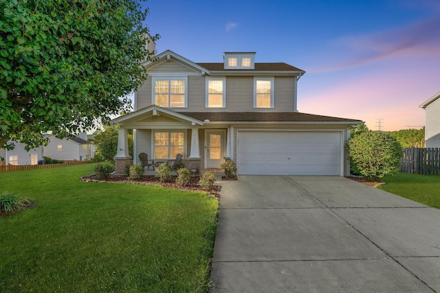 view of front facade featuring a garage, concrete driveway, a front lawn, and fence