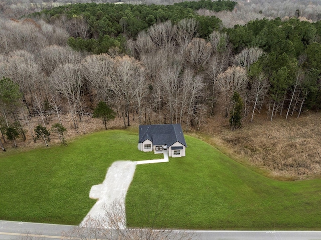 drone / aerial view featuring a forest view