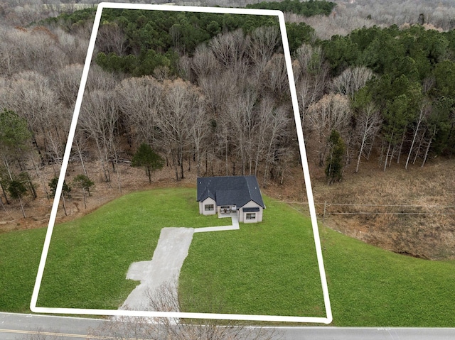 aerial view featuring a view of trees