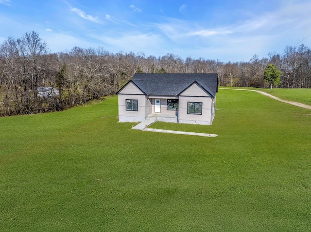 exterior space featuring a front lawn