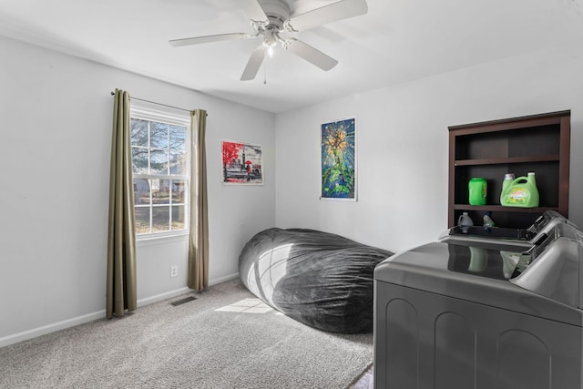 interior space with visible vents, carpet flooring, a ceiling fan, and baseboards