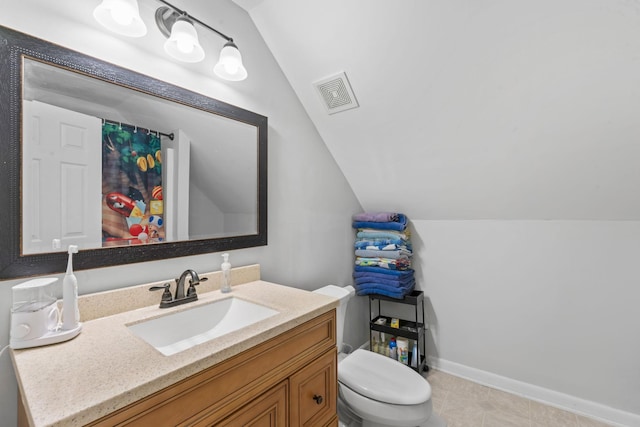 full bathroom featuring baseboards, visible vents, toilet, vaulted ceiling, and vanity