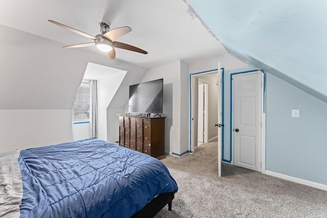 bedroom with lofted ceiling, carpet, baseboards, and ceiling fan