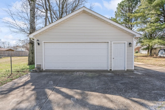 detached garage with fence