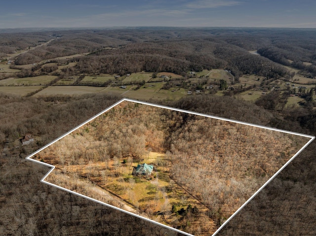 birds eye view of property featuring a rural view