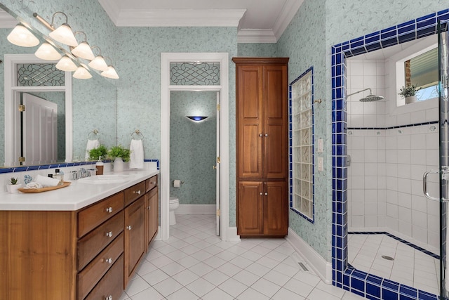 full bath with toilet, wallpapered walls, a shower stall, and ornamental molding