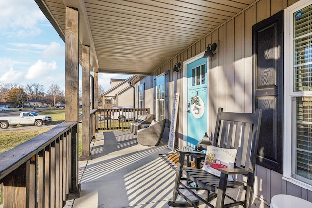 wooden deck featuring a porch