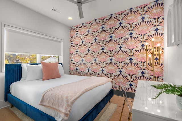 bedroom featuring recessed lighting, visible vents, ceiling fan, and wood finished floors