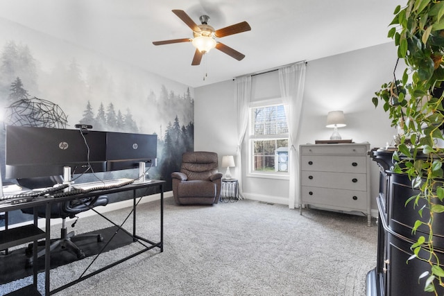 home office with a ceiling fan, baseboards, and carpet flooring