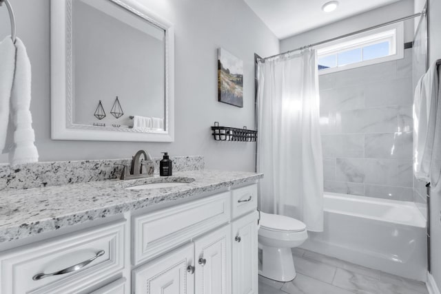 full bath featuring marble finish floor, shower / bath combination with curtain, vanity, and toilet