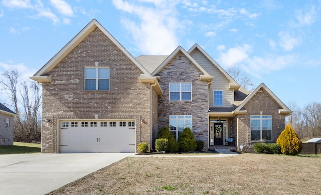 view of front of property with brick siding, a front lawn, and an attached garage