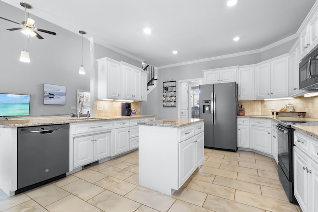 kitchen with a sink, white cabinets, a center island, black appliances, and crown molding