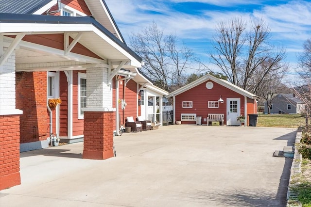 view of home's exterior with brick siding